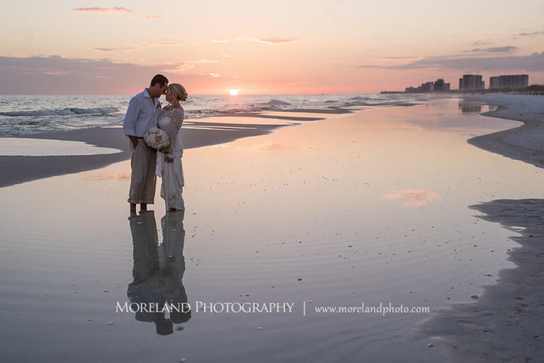 newly wed couple kissing on the beach, Destin Beach, Destin Wedding, Atlanta Photographer, Moreland Photography, Morelandphoto, beach wedding, wedding, beach, barefoot couple, waves, beautiful sunset,