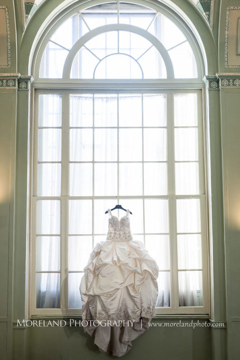 Mike Moreland, Moreland Photography, wedding photography, Atlanta wedding photography, detailed wedding photography, lifestyle wedding photography, Atlanta wedding photographer, 2017 Wedding, Biltmore wedding, Biltmore, wedding dress, ballgown dress, ballroom wedding dress, princess dress, dress silhouette, wedding dress hanging from window, biltmore dress, poofy wedding dress, princess dress, princess wedding dress, sparkly wedding dress top, beautiful wedding dress, 2017 wedding dress, Moreland Photography, The Biltmore Ballrooms, By Bow Event Design and Floral, Malu Esteves, Edgar Zanabria, Kisha Marie Artistry, Elite Pour La Vie, The Modern Gent, Graceful Tables, Cakehouse on Main, Lady G Paperie, Ribbon and Ink, Southern Classic Jewelry, Elegance On A Cloud Limousines, Southern Vintage