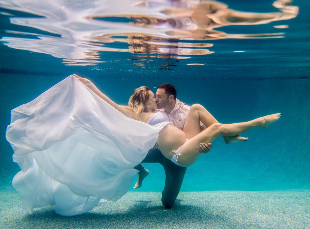 photoshoot of couple underwater